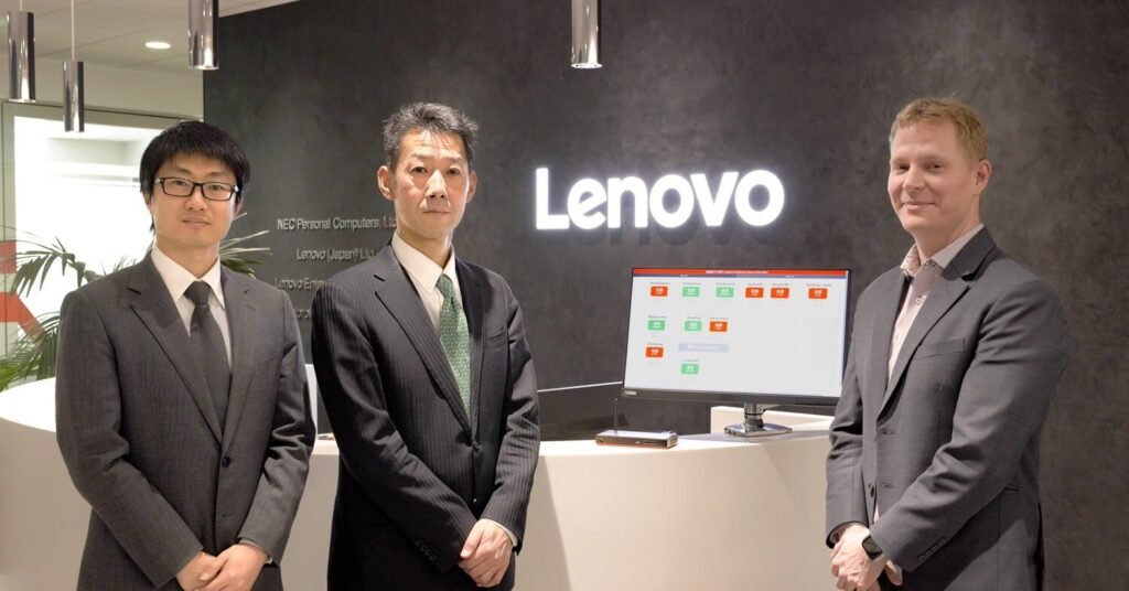 Executive with Lenovo business notebook in a corporate setting