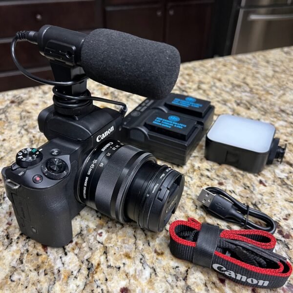 Canon EOS M50 Mark II 24.1MP Touchscreen LCD Mirrorless Camera with neck strap