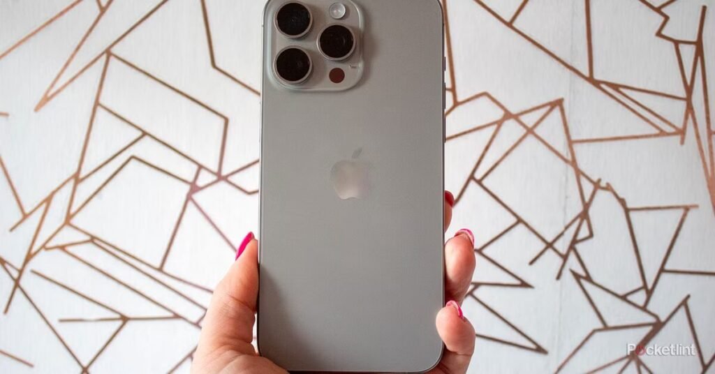 iPhone 15 pro max size comparison showing physical dimensions in hand.